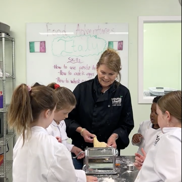 Young Chefs Academy Charleston students making fresh pasta during kids cooking class