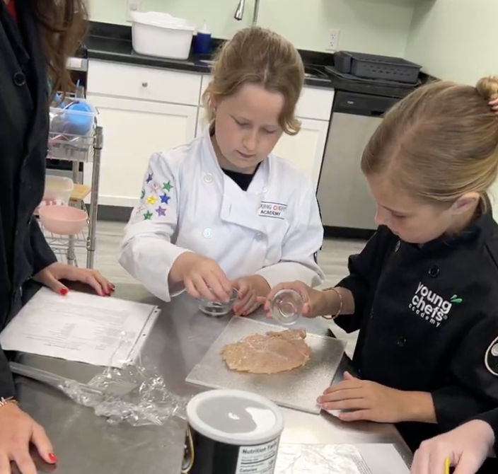 JuniorChefs students preparing Chicken Cordon Bleu in Charleston cooking class