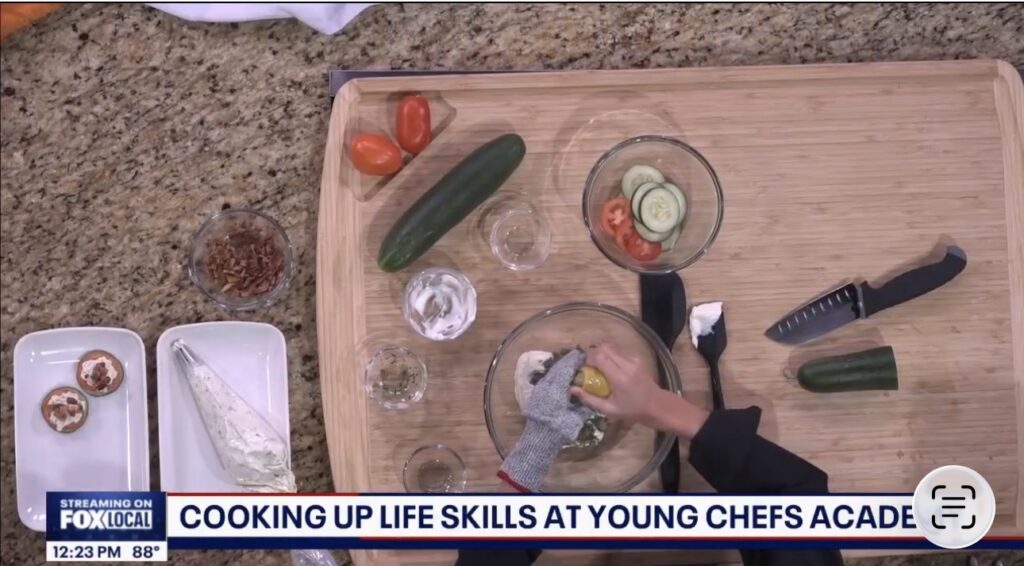 Overhead view of fresh ingredients used to make tangy ranch cucumber bites during a Young Chefs Academy Wesley Chapel cooking demonstration on Fox 13.